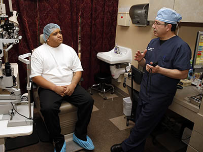 Dr. Abrams and a patient in a consultation for a plan to treat keratoconus